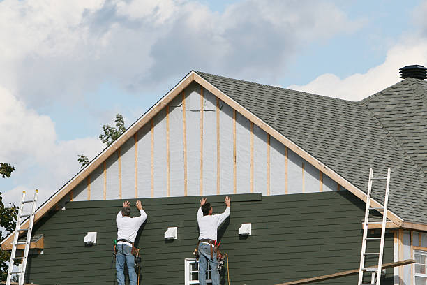 Professional Siding Replacement technician working in Bedford, OH